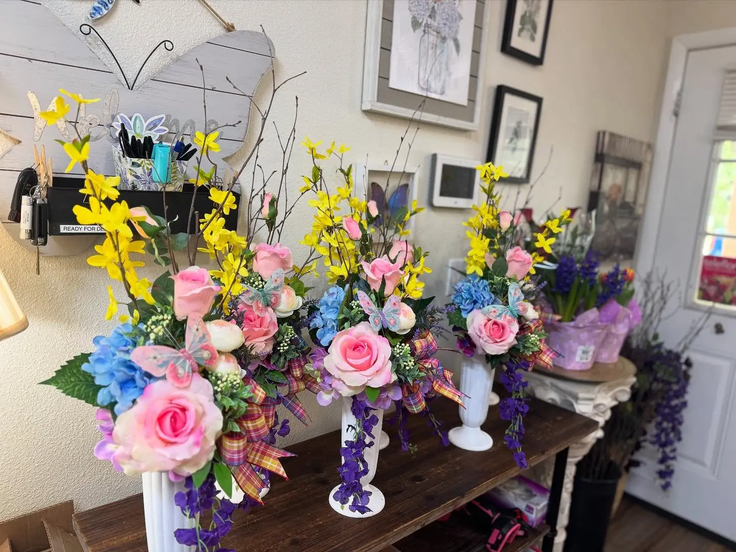 Colorful flower arrangements displayed at Angela's Floral Studio